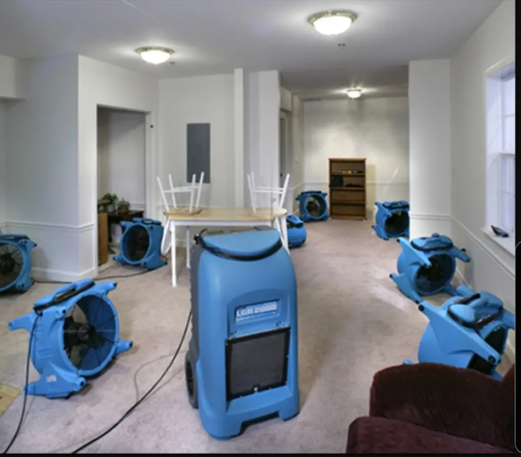 Air movers and dehumidifier setup for Water Damage Restoration in Warsaw